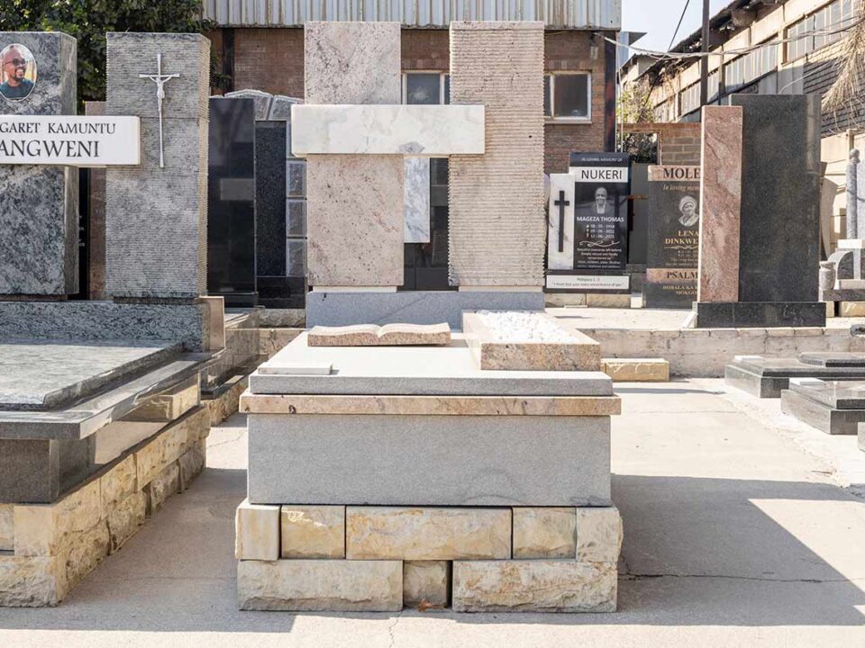 Granite tombstone artisan polishing a headstone at Tombstone Factory South Africa
